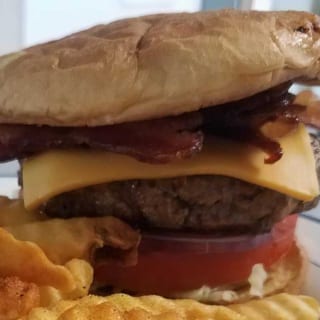 Classic Cheese Burger served with fries or tots