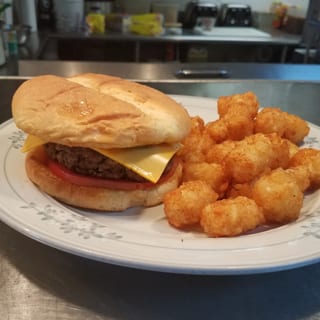 Spicy Burger served with Fries or Tots